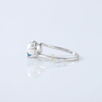 Blue Round Cut Lab Grown Diamond Swirl Bypass Engagement Ring